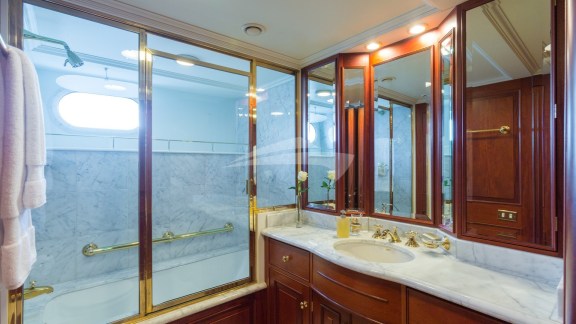 Lady J Guest Stateroom tub with shower overhead