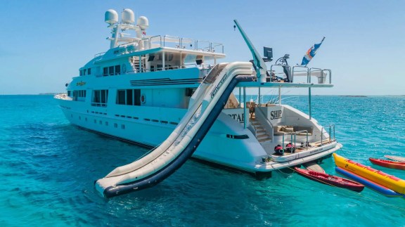 Luxury motor yacht 'Freedom' with inflatable water slide