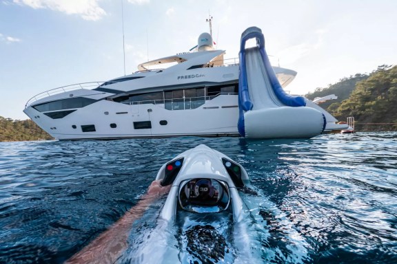 Luxury Motor Yacht Freedom with inflatable water slide and seabob