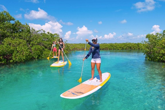 Bahamas paddleboarding in shallow creek