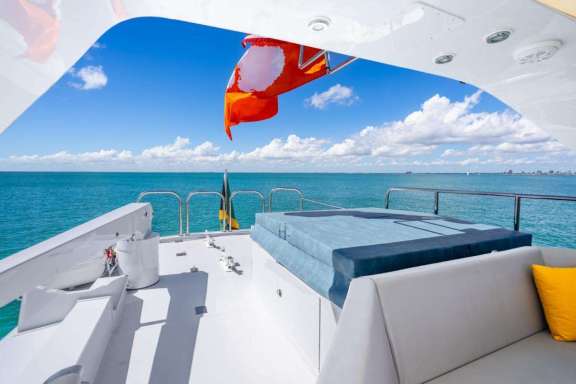 Covered Jacuzzi serves as a sunning pad