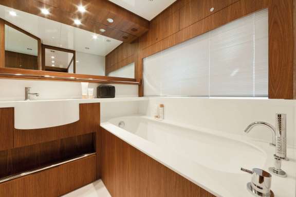 Double sink bathroom with shower walk through.